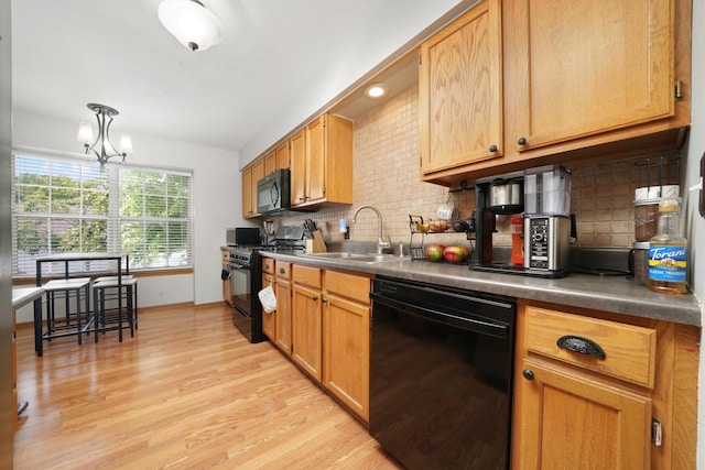 1484 Joshel Ct, Geneva, IL 60134 - kitchen with black appliances, light wood-type flooring, a chandelier, tasteful backsplash, and vaulted ceiling