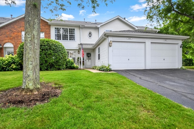 27W415 Providence Ln Unit 103, Winfield, IL 60190 - view of front of house with an attached garage, asphalt driveway, and a front yard