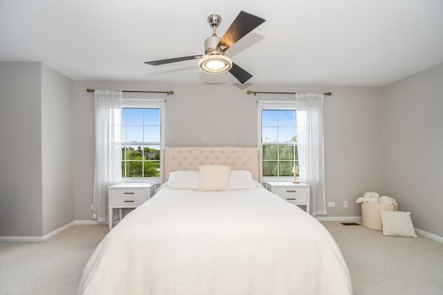 27W415 Providence Ln Unit 103, Winfield, IL 60190 - bedroom with multiple windows, light colored carpet, and a ceiling fan