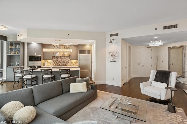 401 N Wabash Ave Unit 44F, Chicago, IL 60611 - living room featuring dark wood-type flooring and baseboards