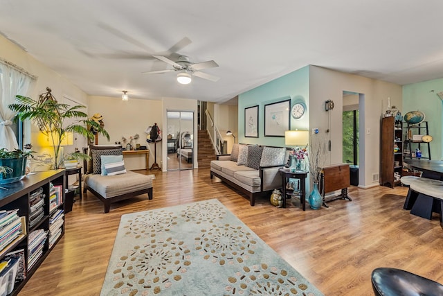 770 Yosemite Trl, Roselle, IL 60172 - living area with light wood finished floors, ceiling fan, and stairs