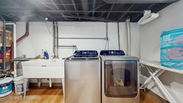 2333 Catherine St, Northbrook, IL 60062 - laundry room featuring separate washer and dryer and wood finished floors