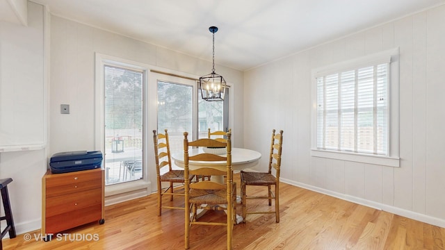 2333 Catherine St, Northbrook, IL 60062 - dining room featuring light wood-type flooring and a chandelier