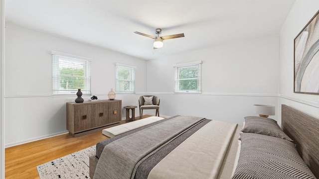 2333 Catherine St, Northbrook, IL 60062 - bedroom featuring multiple windows, wood finished floors, and a ceiling fan