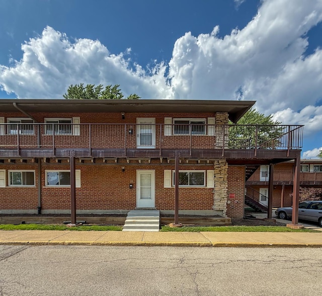 1840 W Hatherleigh Ct Unit 1E, Mount Prospect, IL 60056 - view of front of house featuring brick siding