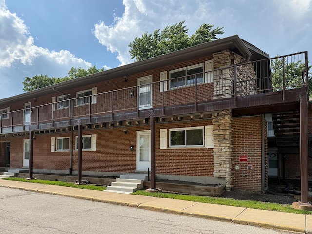 1840 W Hatherleigh Ct Unit 1E, Mount Prospect, IL 60056 - view of front of property featuring brick siding and entry steps