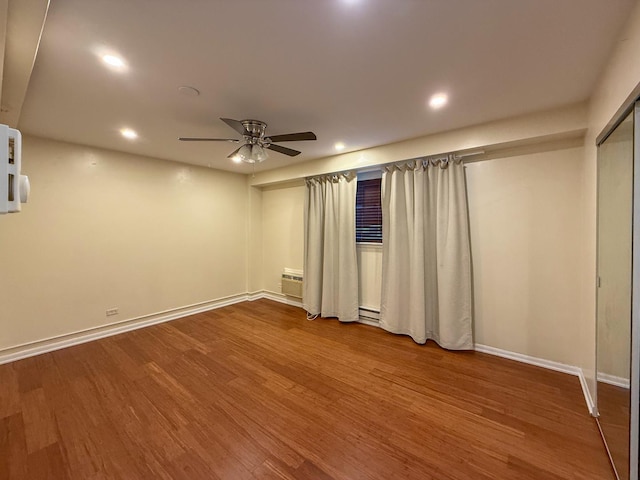 1840 W Hatherleigh Ct Unit 1E, Mount Prospect, IL 60056 - unfurnished bedroom with wood finished floors, recessed lighting, and ceiling fan