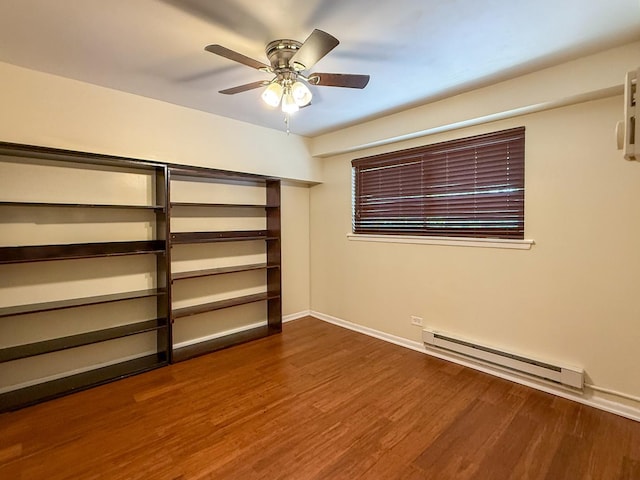 1840 W Hatherleigh Ct Unit 1E, Mount Prospect, IL 60056 - unfurnished bedroom featuring a baseboard radiator, dark wood finished floors, and a ceiling fan