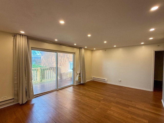 1840 W Hatherleigh Ct Unit 1E, Mount Prospect, IL 60056 - spare room featuring baseboard heating, wood finished floors, and recessed lighting