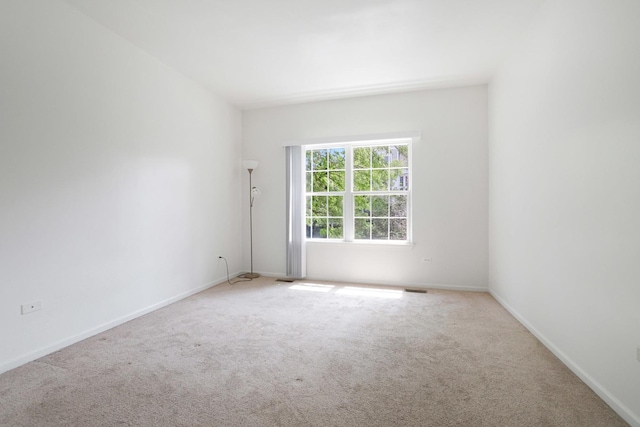 3317 Stratford Ct Unit 2E, Lake Bluff, IL 60044 - carpeted spare room featuring baseboards