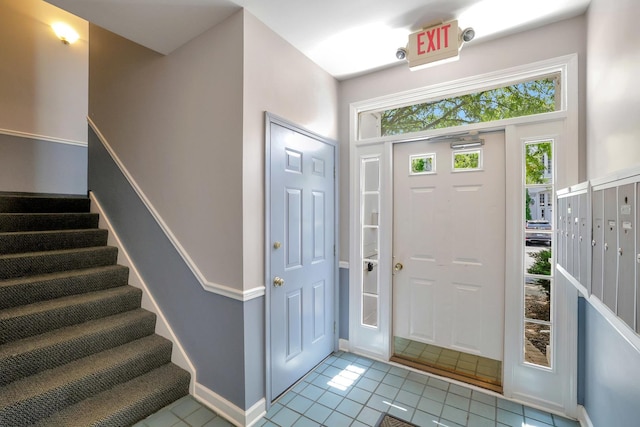 3317 Stratford Ct Unit 2E, Lake Bluff, IL 60044 - foyer entrance featuring tile patterned flooring and stairway