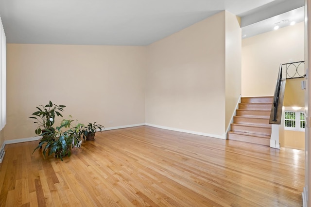535 Glenshire Rd, Glenview, IL 60025 - unfurnished room with light wood-style floors and stairs