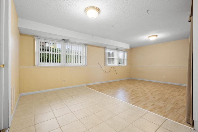 535 Glenshire Rd, Glenview, IL 60025 - unfurnished room featuring a textured ceiling and wood finished floors