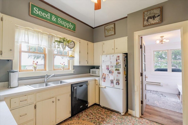 879 2300th Ave, Chestnut, IL 62518 - kitchen featuring white appliances, light countertops, a baseboard radiator, wood finished floors, and crown molding