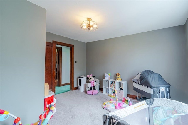 879 2300th Ave, Chestnut, IL 62518 - rec room with carpet flooring and a chandelier