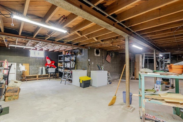 879 2300th Ave, Chestnut, IL 62518 - basement featuring washing machine and clothes dryer