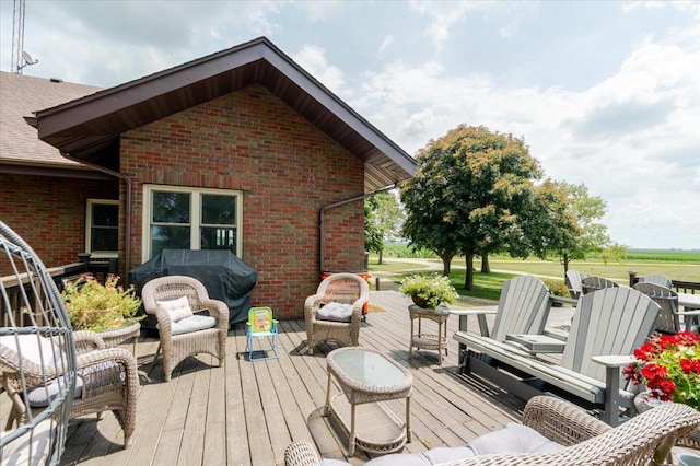 879 2300th Ave, Chestnut, IL 62518 - wooden deck with grilling area and outdoor lounge area