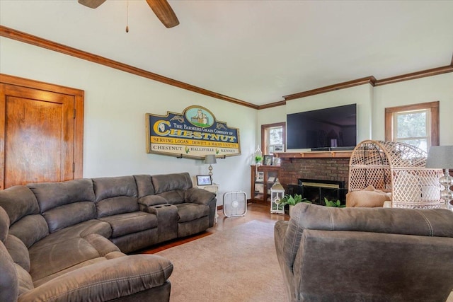879 2300th Ave, Chestnut, IL 62518 - living room featuring a brick fireplace, crown molding, ceiling fan, and wood finished floors
