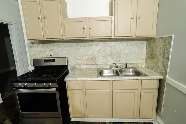12400-02 S Green St, Calumet Park, IL 60827 - kitchen with stainless steel gas range oven, tasteful backsplash, and cream cabinetry