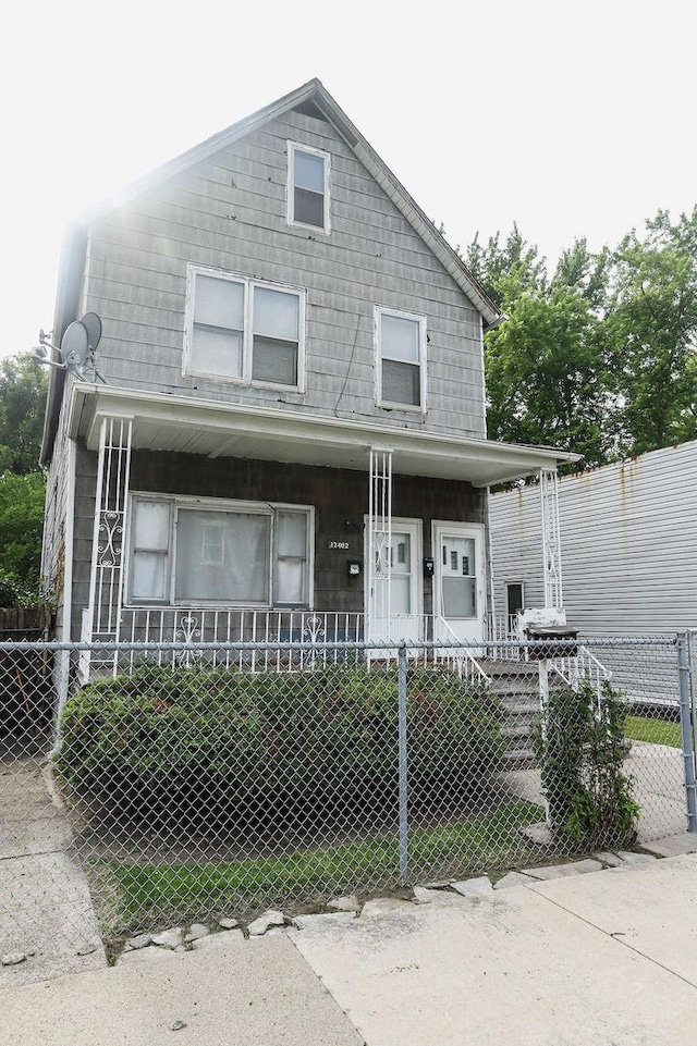 12400-02 S Green St, Calumet Park, IL 60827 - view of front facade with a porch and a fenced front yard