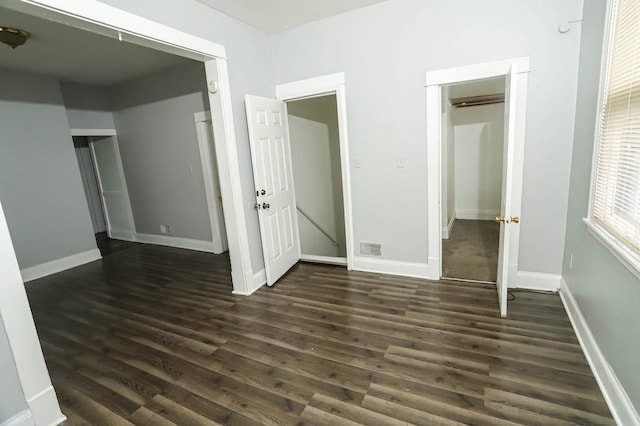 12400-02 S Green St, Calumet Park, IL 60827 - unfurnished bedroom with dark wood-type flooring and baseboards