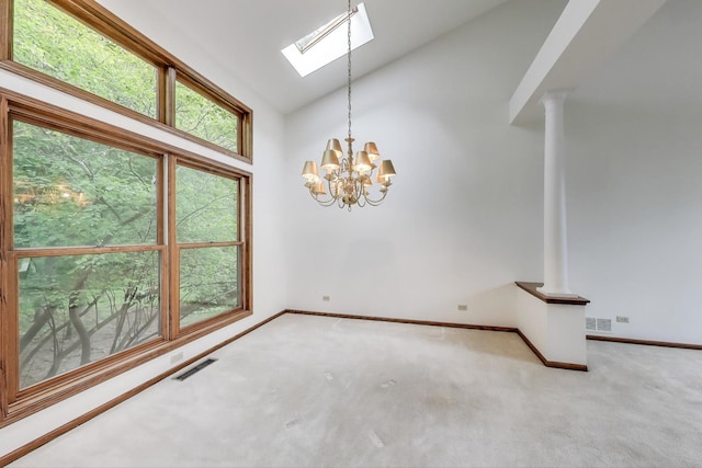 705 Wood Creek Dr, Antioch, IL 60002 - carpeted empty room featuring a skylight, a chandelier, and high vaulted ceiling