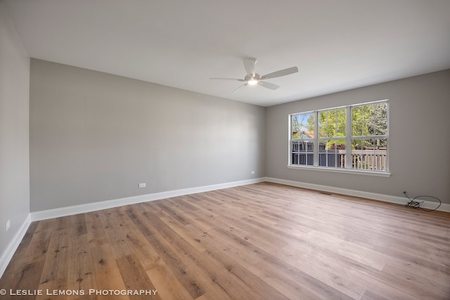 20936 Orange Blossom Ln, Plainfield, IL 60544 - empty room with wood finished floors and a ceiling fan