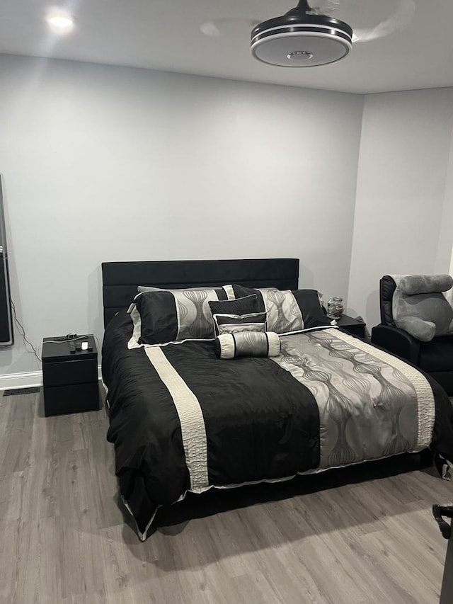 4629 S Langley Ave, Chicago, IL 60653 - bedroom with wood finished floors and baseboards