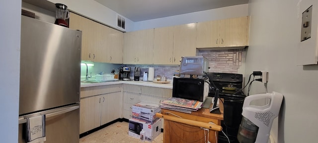 6300 N Sheridan Rd Unit 811, Chicago, IL 60660 - kitchen with freestanding refrigerator, tasteful backsplash, and light countertops