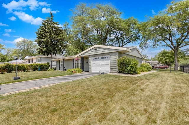 337 E Clark St, Glenwood, IL 60425 - ranch-style house with a garage and concrete driveway