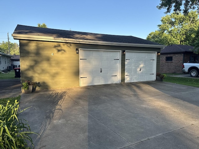 1202 E Van Buren St, Clinton, IL 61727 - garage with concrete driveway
