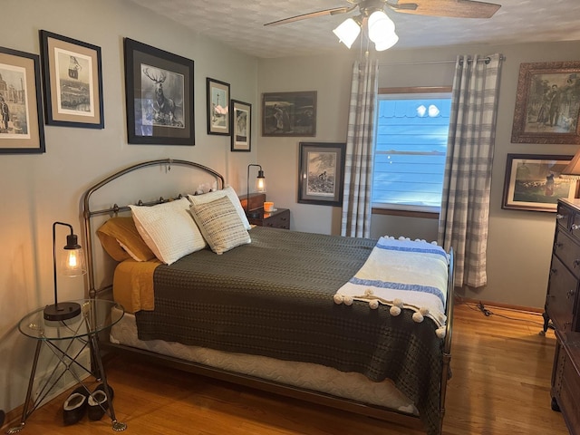 1202 E Van Buren St, Clinton, IL 61727 - bedroom with wood finished floors and a ceiling fan