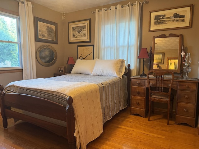 1202 E Van Buren St, Clinton, IL 61727 - bedroom featuring light wood-style flooring