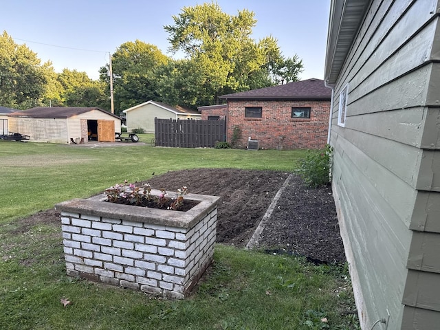 1202 E Van Buren St, Clinton, IL 61727 - view of yard featuring an outdoor structure
