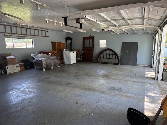 1202 E Van Buren St, Clinton, IL 61727 - garage with washer / clothes dryer and a garage door opener