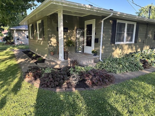 1202 E Van Buren St, Clinton, IL 61727 - ranch-style house with a front yard