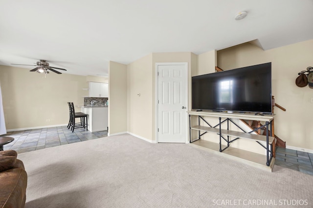 1356 S Lorraine Rd Unit E, Wheaton, IL 60189 - living room with a ceiling fan and carpet