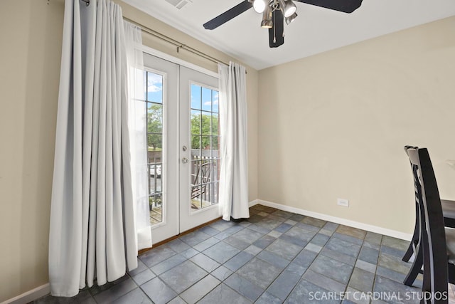 1356 S Lorraine Rd Unit E, Wheaton, IL 60189 - doorway with a ceiling fan and stone finish floors
