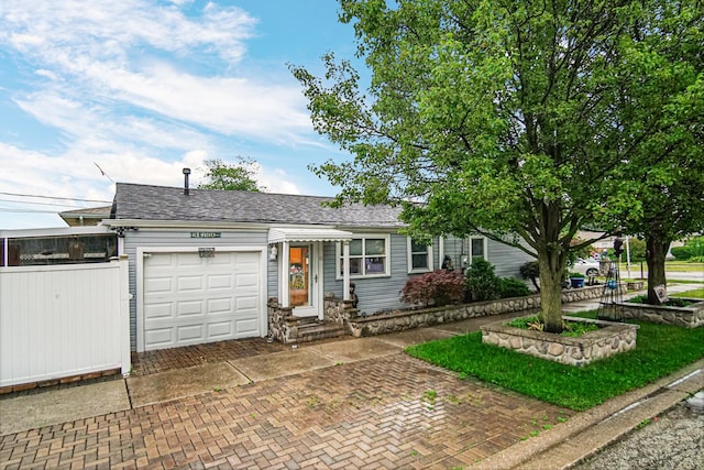 5848 W 89th St, Oak Lawn, IL 60453 - ranch-style house featuring an attached garage, decorative driveway, and a shingled roof