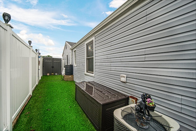 5848 W 89th St, Oak Lawn, IL 60453 - view of side of property featuring a fenced backyard and a storage shed