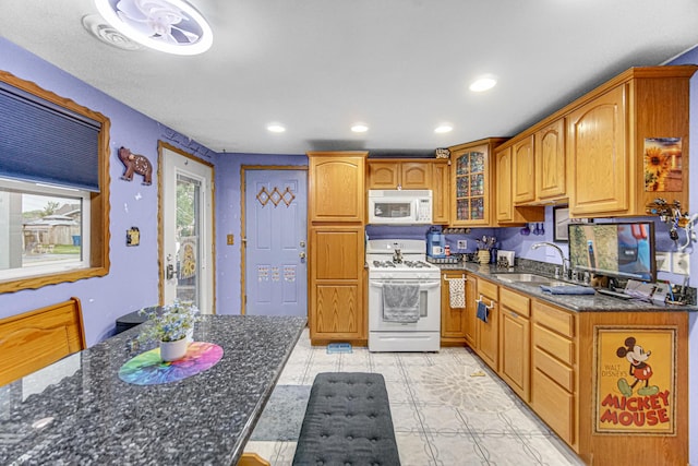 5848 W 89th St, Oak Lawn, IL 60453 - kitchen featuring white appliances, dark stone counters, glass insert cabinets, and recessed lighting
