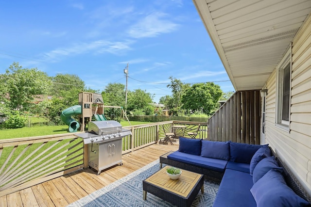 1110 N Main St, Normal, IL 61761 - wooden terrace with an outdoor living space, area for grilling, a fenced backyard, and a playground
