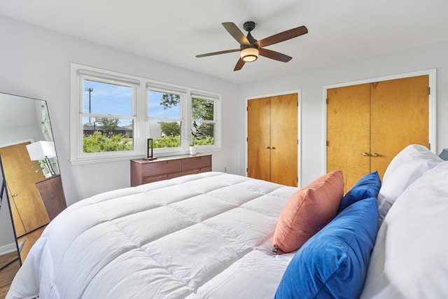1110 N Main St, Normal, IL 61761 - bedroom with ceiling fan and wood finished floors