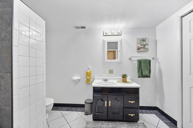 1110 N Main St, Normal, IL 61761 - bathroom featuring vanity and tile patterned floors