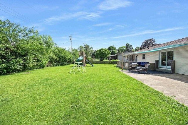 1110 N Main St, Normal, IL 61761 - view of grassy yard with a patio area