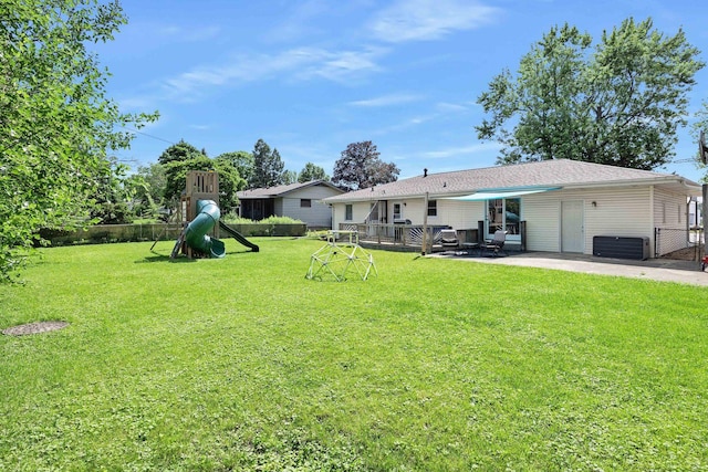 1110 N Main St, Normal, IL 61761 - view of yard with a playground and a patio