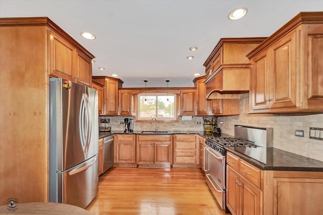 4839 Lamb Dr, Oak Lawn, IL 60453 - kitchen with stainless steel appliances, light wood finished floors, recessed lighting, backsplash, and brown cabinets