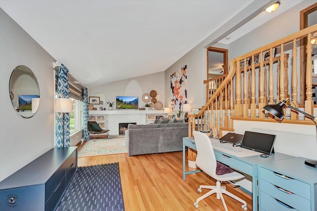 4839 Lamb Dr, Oak Lawn, IL 60453 - office space featuring wood finished floors, lofted ceiling, and a brick fireplace