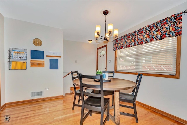 4839 Lamb Dr, Oak Lawn, IL 60453 - dining room with a chandelier and light wood finished floors