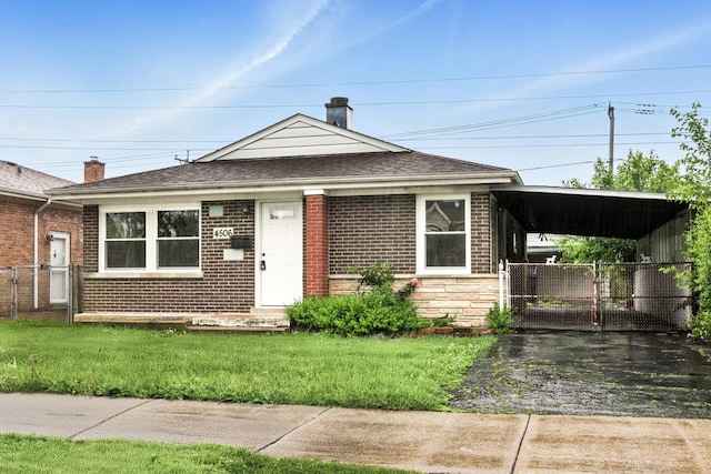 4506 W 77th Pl, Chicago, IL 60652 - view of front facade featuring driveway, brick siding, a gate, an attached carport, and stone siding